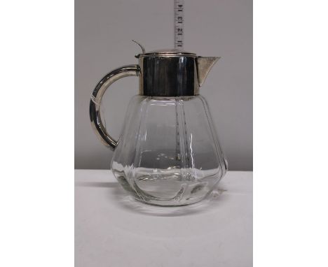 A large vintage silver plated water jug 