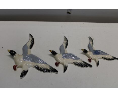 Three vintage wall hanging ceramic birds 