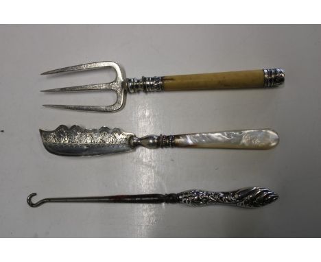 A hallmarked silver bladed butter knife &amp; hallmarked silver handled butter hook plus silver topped toasting fork 