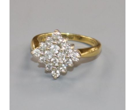 A modern 18ct gold and diamond cluster ring, of diamond shape, size M.