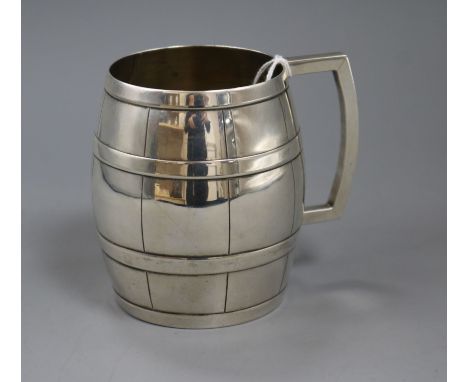 A sterling silver barrel shaped mug, maker C &amp; K, 10.3cm, 7.5 oz.