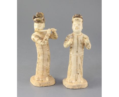 Two rare Chinese Qingbai standing figures of musicians, Song dynasty (11th/12th century), the first figure playing a flute, t