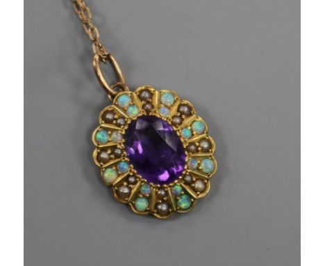 An Edwardian yellow metal, white opal, seed pearl and amethyst oval pendant (converted brooch) on a 9ct gold chain, pendant 1