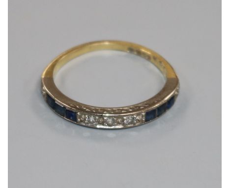 An 18ct gold, diamond and sapphire half eternity ring, size P/Q.