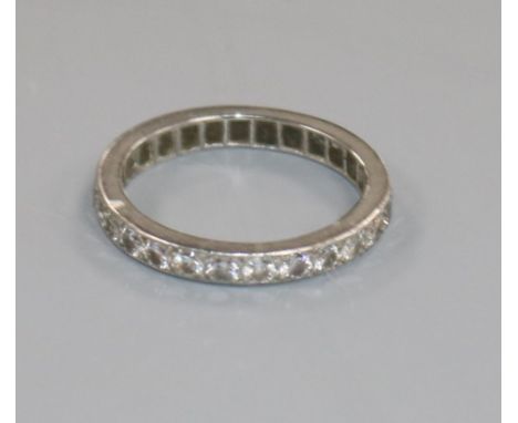 A white metal and diamond set full eternity ring, size M.