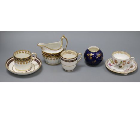 An English porcelain milk jug and cup and saucer, a Derby cup &amp; saucer, a Dresden cup and saucer and a Worcester vase