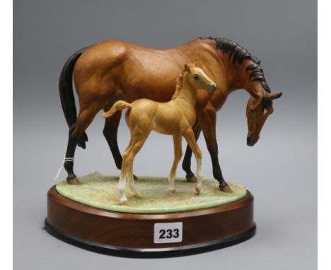 A Royal Worcester figure 'Princess Grace and foal' height incl. stand 23cm