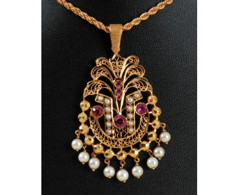 A filigree Ruby and Seed Pearl Pendant on rope twist chain and an Indian gold faceted bead Necklace