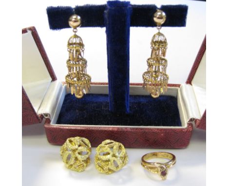 A Ruby Snake Ring set single circular-cut stone to head, a pair of pierced textured gold Earrings, stamped 750 and a pair of 