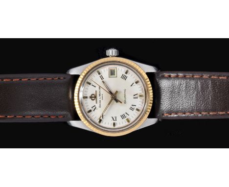 A Baume and Mercier Baumatic Wristwatch, the cream dial with roman numerals and baton markers, sweep seconds hand and date ap