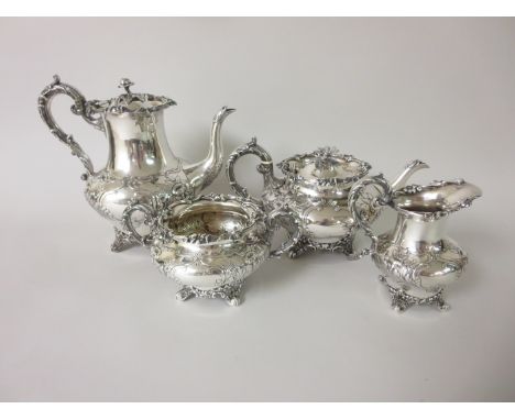 A Victorian silver four piece Tea and Coffee Service with floral embossing and foliate borders, London 1841