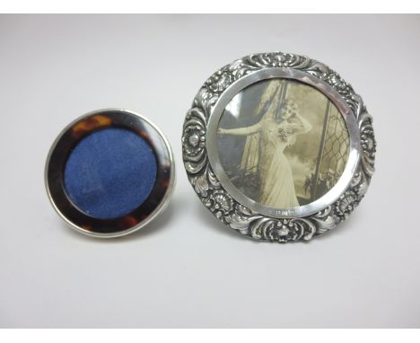 A Victorian silver circular Photograph Frame, scallop and scroll embossed Sheffield 1900, and a silver and tortoiseshell smal