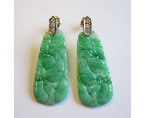 A pair of Jade and Diamond Ear Pendants each pav-set three brilliant-cut diamonds above carved and pierced jade drop