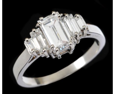 A Diamond five-stone Ring corner claw-set step-cut stone, 1.01cts between two pairs of graduated baguettes, ring size M, acco