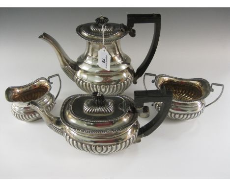 An Edward VII/Victorian silver four piece Tea Service of semi-fluted boat shape, Chester 1898/1901
