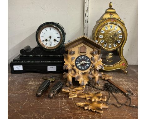 A Belge Noir mantle clock, cuckoo clock and one other 