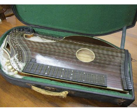 A 19th century cased harp/lute