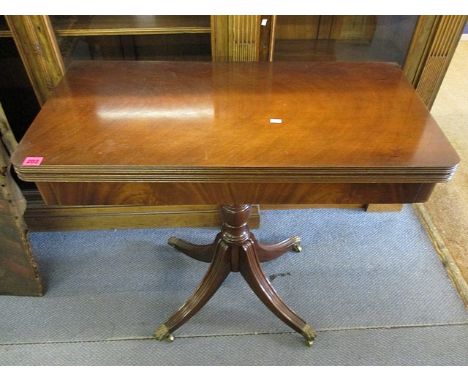 A modern reproduction of a Regency  mahogany card table, 30 high, 33 1/2 wide