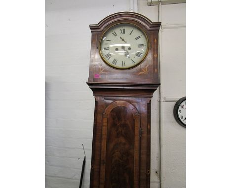 A George III inlaid and crossbanded mahogany longcase clock having an arched hood, door and box base, on bracket feet with an