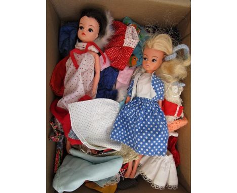 Two vintage Sindy dolls, circa 1970/80, and a selection of mostly Sindy vintage clothes