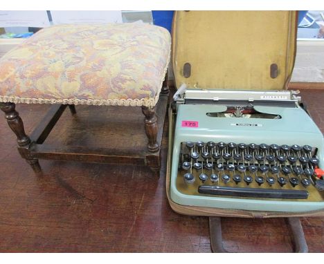 A turned foot stool and an Olivetti typewriter