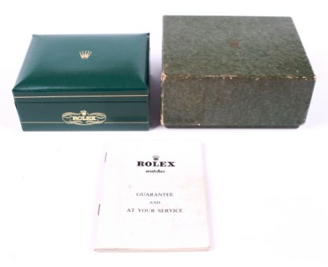 A vintage green Rolex box, circa 1960s, with original cardboard outer box. Condition Report: The guarantee booklet is not bla