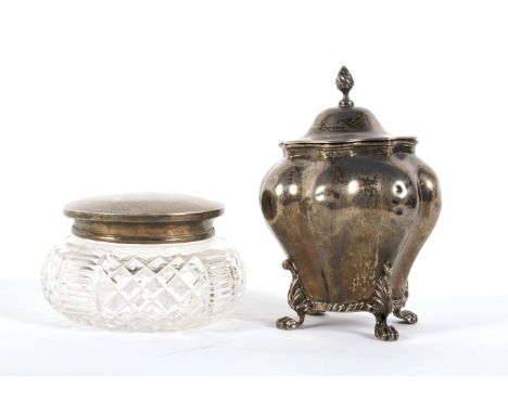 A late Victorian silver tea caddy and a silver mounted glass jar. The tea caddy by George Nathan and Ridley Hayes, hallmarked