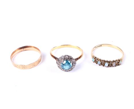 Three gold and gem set rings. Comprising a blue-zircon and diamond cluster ring, indistinct marks possibly '18(?)', size S, 3