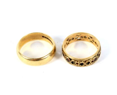 Two 9ct gold rings. One being a gem set full eternity ring, the other a wedding band, ring size O and P, combined weight 8.3g