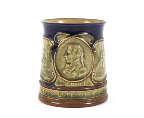 A late 19th century Royal Doulton stoneware commemorative Lord Nelson mug. Impressed and incised marks, shape no N6424, mould