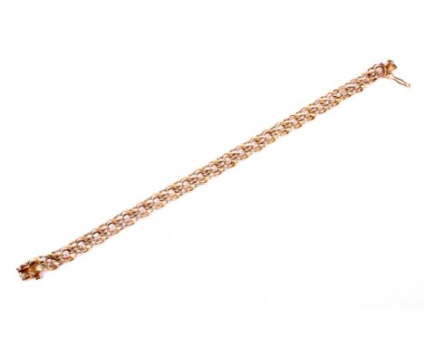 A vintage 9ct gold double-curb link bracelet on a box snap. Hallmarks for London 1977, 19cm long, 6.8 grams