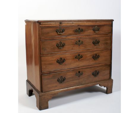 A Georgian mahogany chest of drawers. With brushing slide above four long graduated drawers, on bracket feet, L87cm x D44cm x