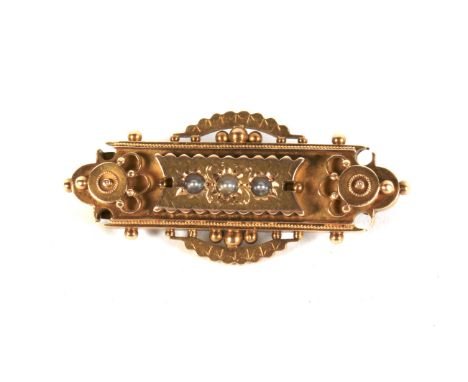 A late Victorian gold and half-pearl brooch. The hollow rectangular panel set with three small half-pearls within a bead and 