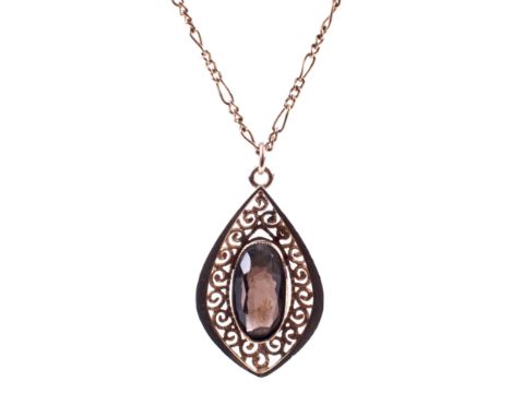 A 9ct gold and smokey quartz drop-shaped pendant and necklace. The pendant centred with an oval mixed-cut smokey quartz appro