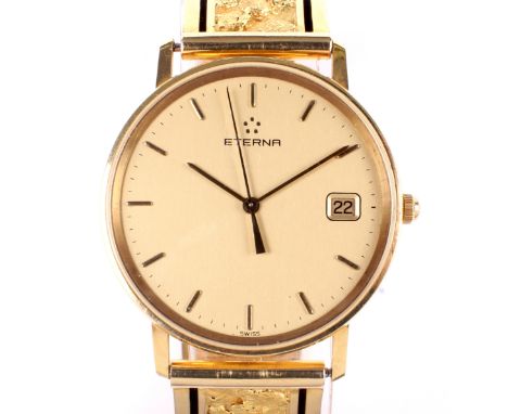 A vintage 18ct gold cased gents Eterna wristwatch. The gilt dial with batons denoting hours, with date aperture at the quarte