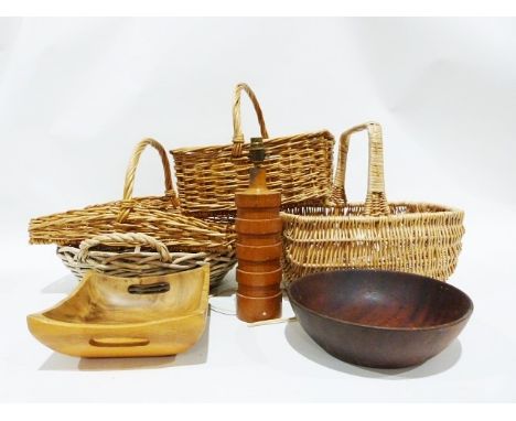 Four assorted wicker baskets, a turned wooden table lamp base&nbsp;and two wooden bowls