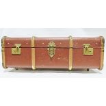 Vintage wooden bound trunk with added castors