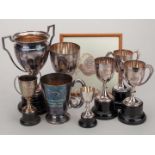 A group of eight Archie Butterworth motorsport trophies