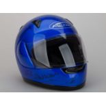 A blue signed helmet from Goodwood Festival of Speed.