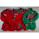 Three red Toyota race suits
