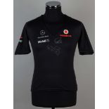 Lewis Hamilton and Jenson Button signed Vodafone McLaren signed t-shirt.