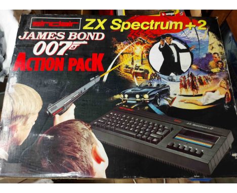 A vintage Sinclair ZX Spectrum Plus 2 James Bond 007 Action Pack computer game with extra games