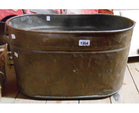 A large two handled copper planter - one handle missing