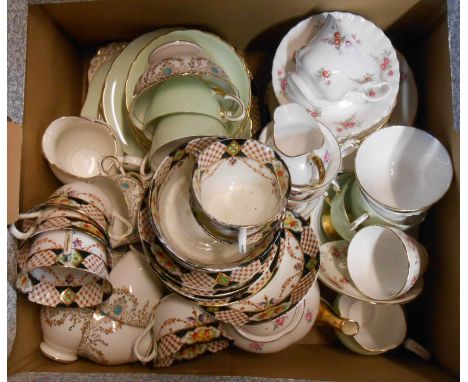 A box containing a quantity of ceramic items including Tuscan china part tea sets, etc.