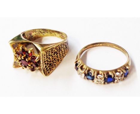 A 9ct. gold ring, set with four sapphires interspersed with diamond chips - sold with a vintage silver gilt garnet cluster ri