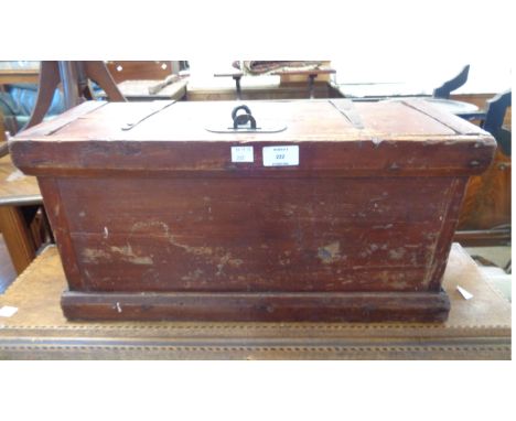 A 53cm stained pine chest with iron strap hinges and hasp, containing assorted tools