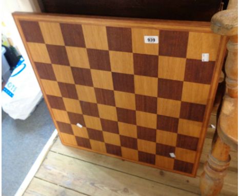 A large wooden chess board