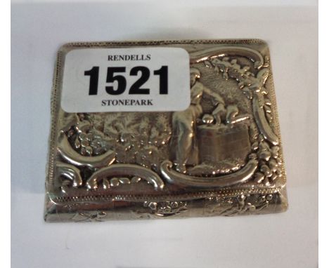 A continental white metal bombe form snuff box with all over embossed scene decoration and gilt interior