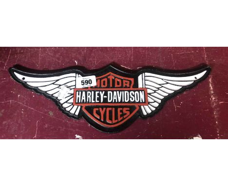 A modern painted cast iron Harley Davidson Motorcycles sign