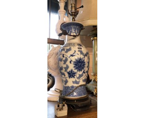 A modern Chinese porcelain table lamp of vase form with hand painted and transfer printed floral decoration